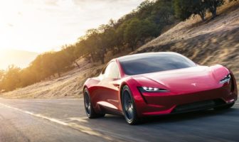 Hit the road Tesla rocks the auto industry with two stunning debuts